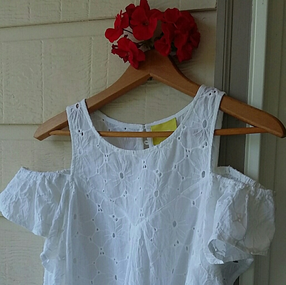 From Anthropologie cold shoulder eyelet top